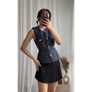 Women's dark blue tweed sleeveless vest with gold buttons and matching belt outfit
