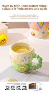 Macro detail of ceramic mug with creative beaded handle and cartoon embossed pattern