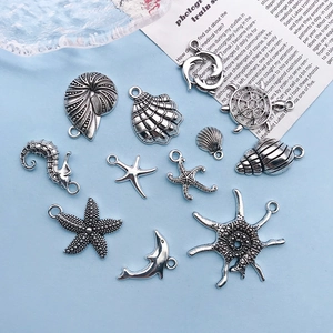 Antique silver ocean charms set with turtle starfish and dolphin for DIY jewelry making