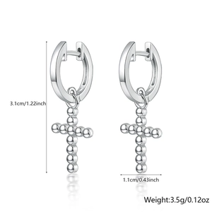 Detail view of silver cross earrings with dimensions 3.1cm length and 3.5g weight