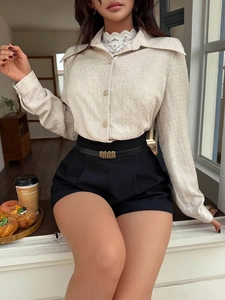 Elegant beige long sleeve textured shirt with pointed collar and gold button details