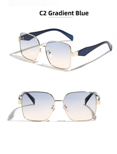 Detail of square gold metal sunglasses with blue and yellow gradient lenses