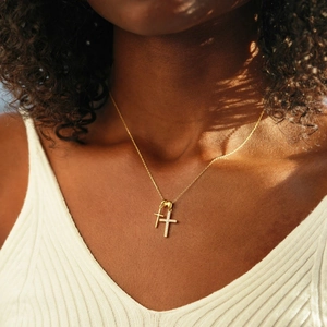 S925 sterling silver double cross zircon necklace shown on a model with a gold finish