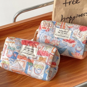 Quilted cartoon toiletry bag with hand-painted illustration and vintage zipper closure