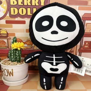 Cartoon Halloween skeleton plush toy with white skull head and black bone print body