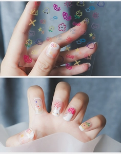 Detail of 5D matte nail stickers with colorful graffiti hearts and flower patterns