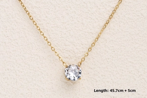 Detailed view of 18K gold plated necklace with 4-claw round solitaire and size 45.7+5cm