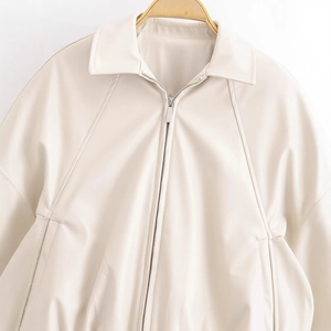 Classic beige PU leather jacket with lapel collar and silver zipper closure detail