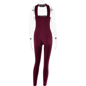 Back view of a deep red halter neck backless bodysuit in a slim fit stretchy fabric