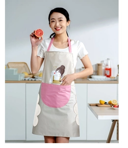 Detail of waterproof apron with absorbent hand towels and cartoon girl coffee pattern