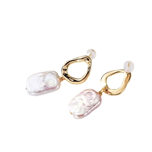 Minimalist baroque pearl drop earrings with golden metal studs and purple-white luster