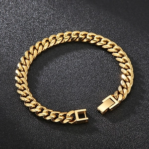 Gold Cuban link bracelet featuring one polished side and one frosted side on black surface