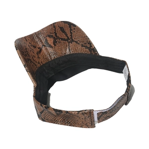 Detail of snake print sun visor with adjustable velcro strap and black sweatband