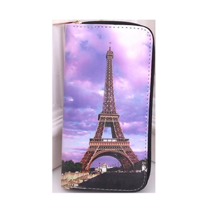 Long zipper wallet with Eiffel Tower print on a romantic pink purple sky background