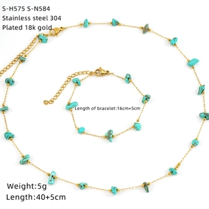 Detailed set of 18k gold plated stainless steel necklace and bracelet with turquoise stones