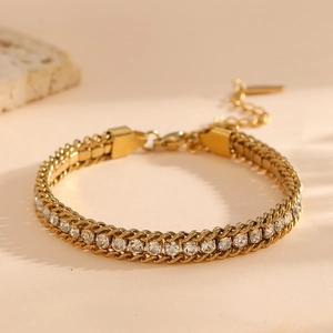Close-up of 18k gold-plated titanium steel bracelet with sparkling clear zircon stones