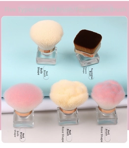 Detail showing five assorted makeup brushes with rose and bulb shaped bristles