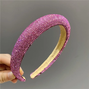 Sparkly full rhinestone padded headband in magenta with premium gold satin lining