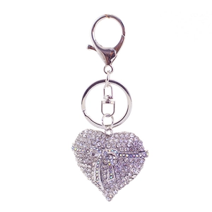 Sparkling silver heart keychain with crystal rhinestones and elegant bow charm accessory