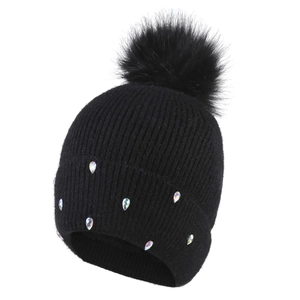 Black knit beanie with colorful crystals and a fluffy pom-pom on white background