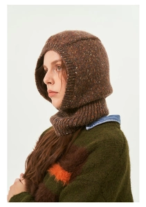 Close-up of brown speckled knit Balaclava hood with warm winter texture on model