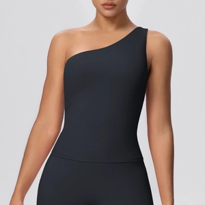 Close-up of the black one-shoulder yoga vest showing the elastic fabric and slim fit