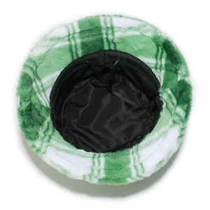 Detail of the inner lining and adjustable drawstring of this green plaid faux fur bucket hat