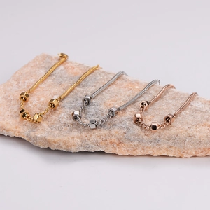 Polished stainless steel snake chain bracelets in gold, silver and rose gold finishes