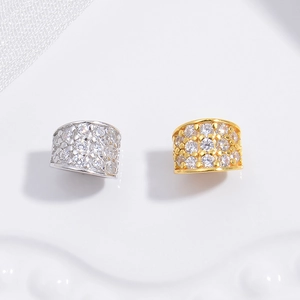 Macro shot of silver and gold plated S925 sterling silver slider beads with shiny zircons