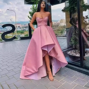 Elegant pink strapless high-low satin evening gown with pleated waist for gala events