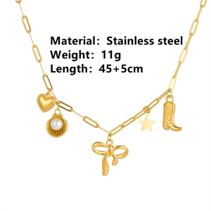 Gold stainless steel shell necklace with heart and pearl charms on white background
