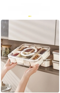 Detail of food-grade 8-compartment container with portable handle for kitchen storage