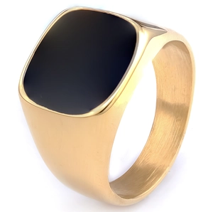 Detail of gold brushed stainless steel ring with a square black onyx inlay surface