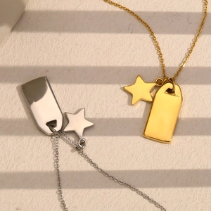 Detailed view of gold and silver square star pendants on 18K plated stainless steel chains