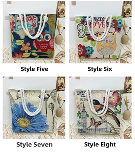 Detail view of canvas tote bags with thick rope handles and vintage owl and floral patterns