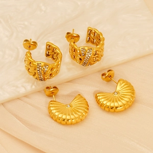 Golden irregular titanium steel earrings set with shell texture and sparkling crystals