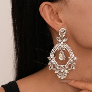 Luxury oversized silver earrings with sparkling flower crystals and waterdrop pendants