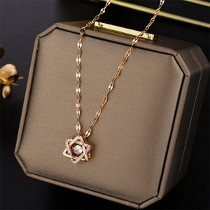 Sparkling hexagram star pendant with zircon on 18K rose gold plated titanium chain