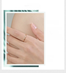 Close-up of 925 silver crown ring with marquise-cut pink and white gemstones