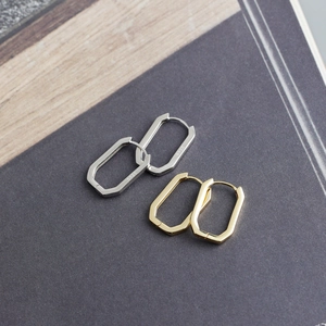 Detailed view of square geometric hoop earrings in gold and silver S925 sterling silver