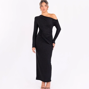 Detail of elegant black off-shoulder maxi dress with ruched waist and shimmering fabric