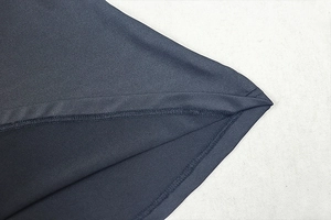 Detail of the high-quality double-stitched hem and fine jersey texture on this dress