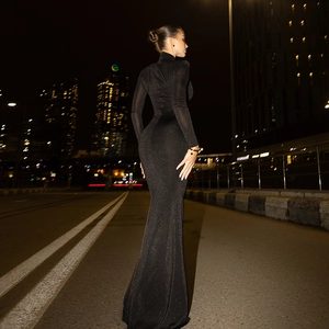 Elegant black high-neck long sleeve mermaid dress with a sleek floor-length fit