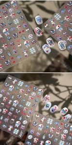 Detail of M-1278 cartoon nail stickers featuring blue butterflies and cupcake designs