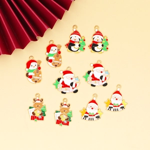 Christmas musical charms featuring reindeer and snowmen in colorful alloy enamel finish