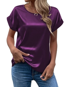 Detail of elegant purple satin short sleeve blouse showing silk-like fabric texture