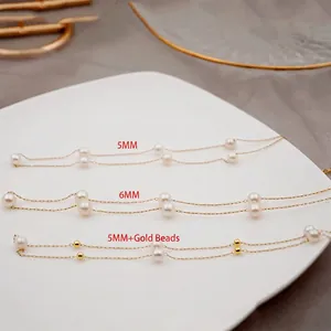Three dainty freshwater pearl necklaces in 5mm and 6mm sizes on thin gold chains