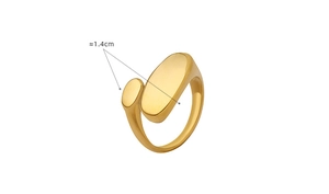 Detail of adjustable gold titanium ring showing 1.4cm span between oval brushed surfaces