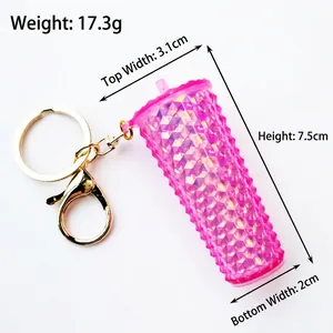 Detailed view of pink diamond textured coffee cup keychain with gold clasp and dimensions