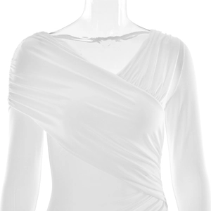 Detail of elegant white long-sleeved dress with cross-pleated V-neckline drape on mannequin